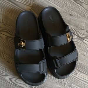 Steve Madden Black Slide Sandals with Gold Buckle